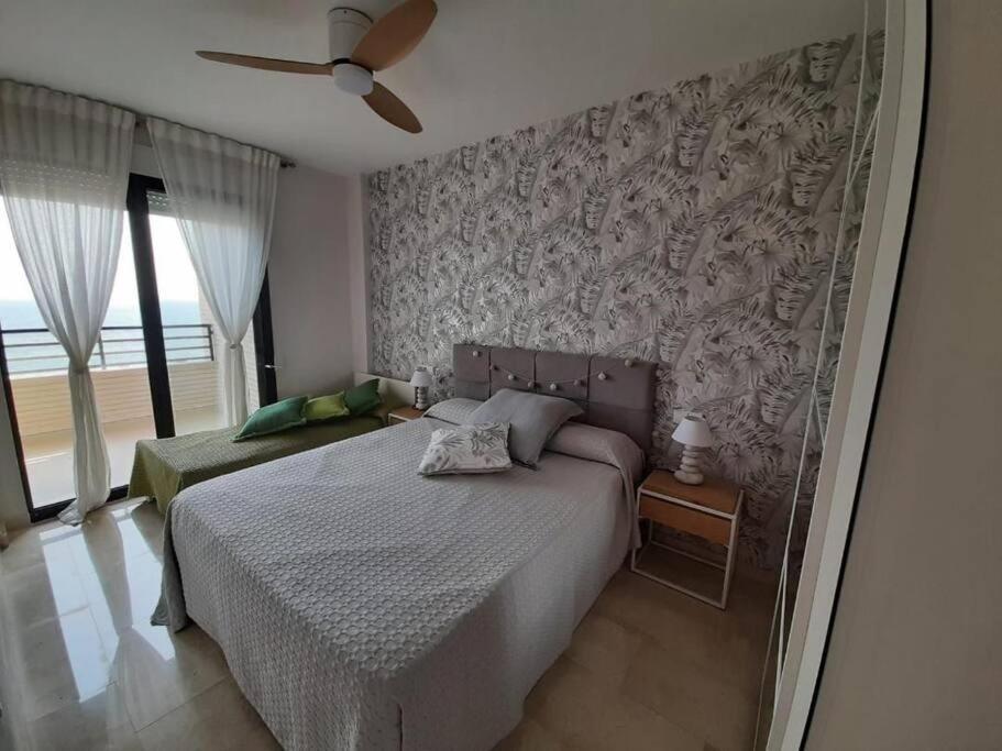 Top-Floor Beachfront Apartment With Parking, Pool, & Spacious Sea-View Balcony Villajoyosa Bagian luar foto